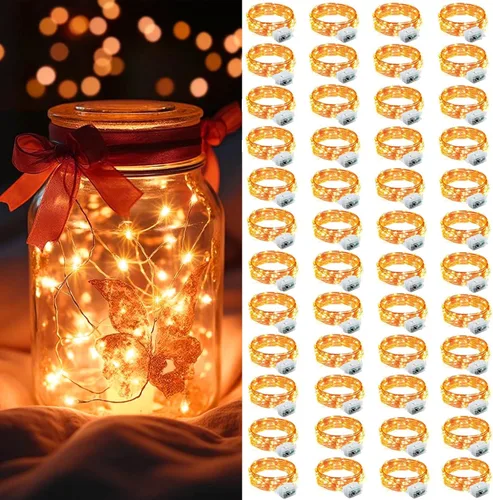 Vista 43 de AIKEI Paquete de 12 luces LED de hadas que funcionan con pilas, guirnaldas de luces impermeables de 7 pies, 20 luces LED de luciérnagas estrelladas