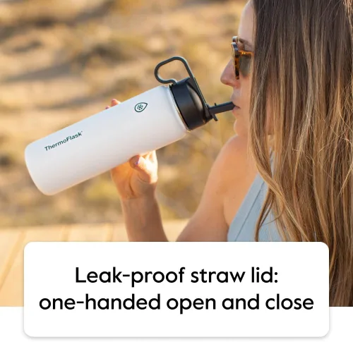 Vista 4 de Thermoflask - Botella de agua de acero inoxidable con doble aislamiento y dos tapas, 18 onzas, negro