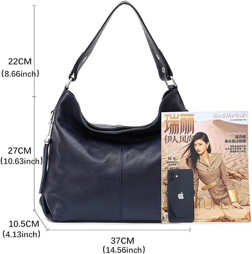 Vista 2 de Bolso de mano de piel auténtica con borla para mujer, color negro y blanco
