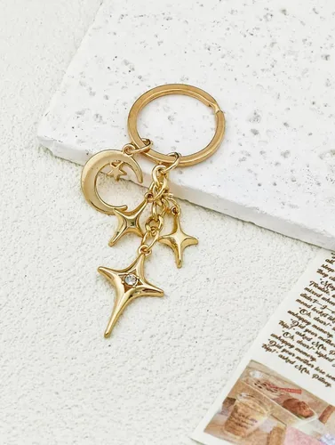 Vista 2 de Llavero de estrella brillante dorado con dije celestial, llavero de metal duradero para llaves, bolsas, regalo estético, decoración de fiesta