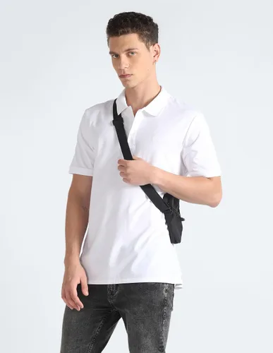 Vista 6 de Calvin Klein Polo de algodón liso con logotipo de monograma para hombre