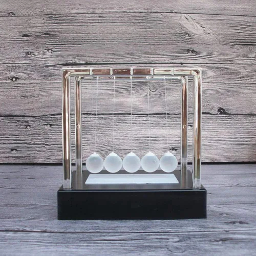 Vista 7 de LIZEALUCKY Luminiscencia LED Newtons Cuna Balance Bola de péndulo Bolas Coloridas Equilibradas Bolas de Juguete Ciencia Péndulo Decoración de Mesa