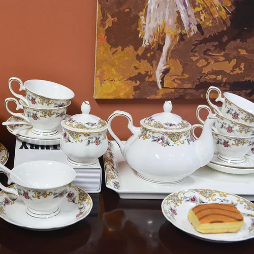 Vista 4 de ACMLIFE Juego de té de porcelana de hueso para adultos, juego de té de porcelana fina blanca y floral de 21 piezas, juego de 6 tazas de té inglés