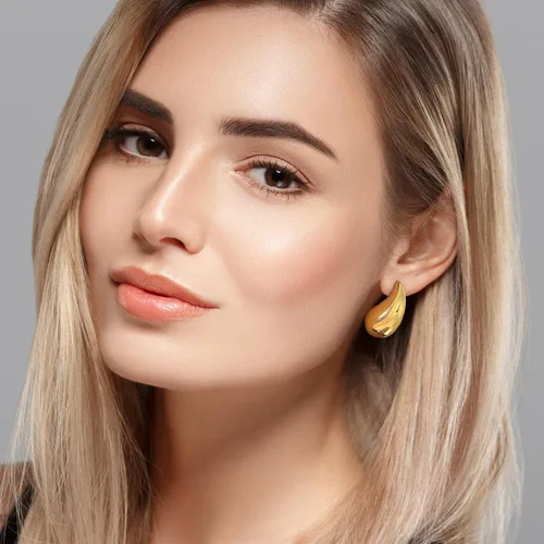 Vista 6 de Aretes de aro de acero quirúrgico 316L gruesos en forma de lágrima de oro para mujer, aretes de gota de agua, ligeros, hipoalergénicos, de diseño