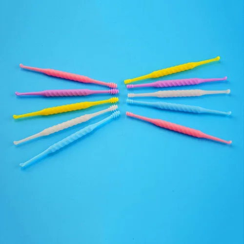 Vista 3 de 12 unids desechables oído Pick eliminación de cera de oído plástico herramienta de limpieza de oídos Cureta cuchara limpiador para cuidado personal