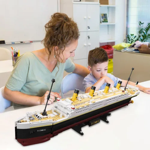 Vista 4 de NETEHU - Juego de bloques de construcción modelo Titanic Boat de 1465 piezas, modelo de crucero de ladrillos, juguetes educativos de bricolaje