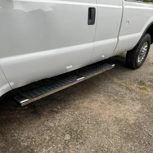 Vista 2 de Estribos compatibles con Ford F150 Super Cab 2015-2024. Barras Nerf de acero inoxidable para Ford Super Cab.