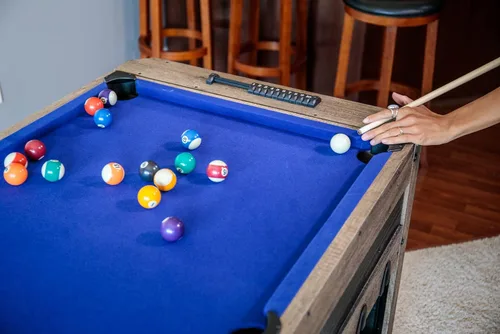 Vista 5 de Triumph - Mesa de juegos múltiples giratoria 4 en 1 de 56 pulgadas - Hockey de aire, Billar, Futbolín, Ping Pong - Acabado de grano de madera rústica