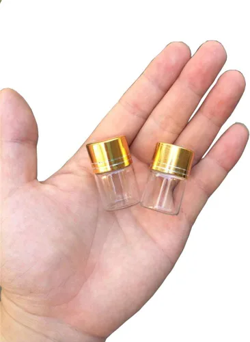 Vista 2 de 24 botellas de vidrio de 0.2 fl oz Tapa de aluminio Tapa dorada Vacío Transparente Transparente Contenedor de regalo Líquido Deseo Botellas Frascos