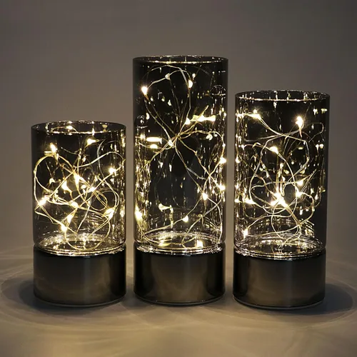 Vista 2 de Rhytsing conjunto de 3 linternas de cilindro de vidrio con luces de hadas, lámpara de mesa decorativa con batería, vela sin llama con función