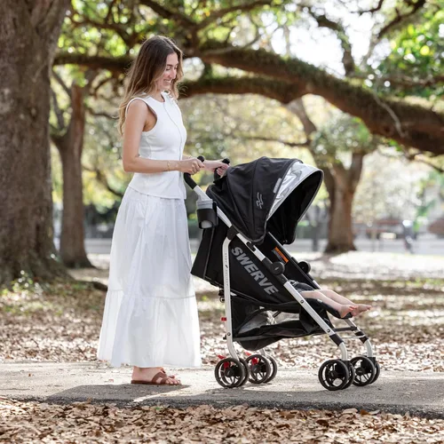 Vista 2 de Baby Delight Carriola Swerve Ligera para viajes y todos los días Reclinación multiposición Plegado compacto Almacenamiento extra Negro