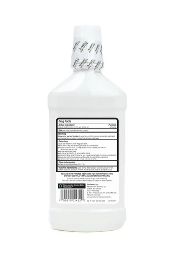 Vista 2 de Amazon Basics Enjuague bucal anticaries blanqueador, sabor menta fresca, blanquea los dientes, previene caries, 16 onzas líquidas, 1 paquete