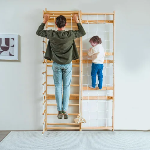 Vista 2 de Avenlur Neem Escalera de Pared Sueca 5-in-1 kids home gym: climbing wall kids love, indoor swing for kids, pull up bar for kids, stair slides