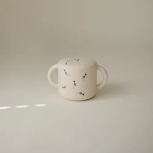 Vista 4 de mushie - Taza para merienda de silicona Contenedor de alimentos a prueba de derrames para niños pequeños y bebés (Abejas)