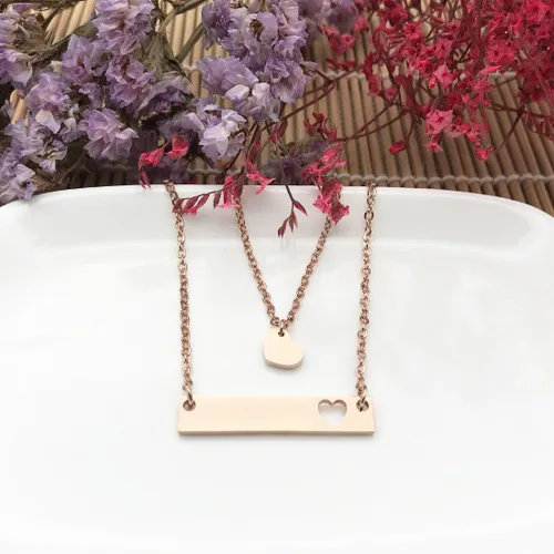 Vista 2 de JJTZX - Juego de collares dijes de corazón y de orificios en forma de corazón para mamá e hija (s)