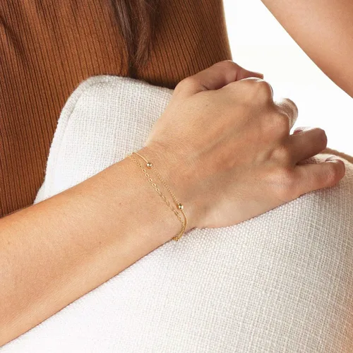 Vista 5 de Pulsera de cadena de oro de 18 quilates con perlas pequeñas de la suerte de ojo malvado turquesa conjunto de pulseras minimalistas apilables