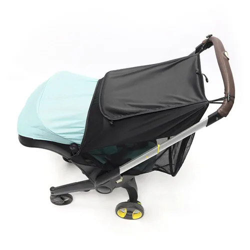 Vista 2 de DOONA - Parasol 2 en 1 para cochecito de bebé y asiento de automóvil, extensión de protección UV, cubierta solar, toldo de cobertura completa