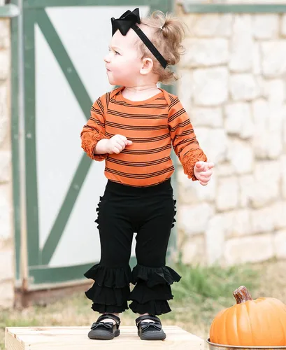 Vista 4 de RuffleButts® Diadema con lazo negro para niñas, talla única