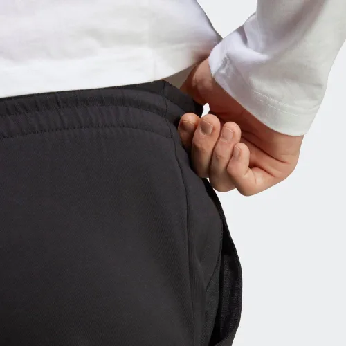Vista 8 de adidas Pantalones Essentials de punto único con puños cónicos para hombre