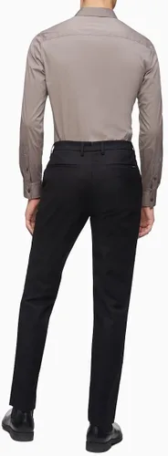 Vista 2 de Calvin Klein Pantalones chinos modernos elásticos resistentes a las arrugas para hombre en corte ajustado