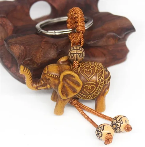 Vista 3 de HomeSoGood Llavero colgante de elefante tallado de madera, 10 unidades, lindo llavero tallado, joyería encantos, accesorios, Marrón