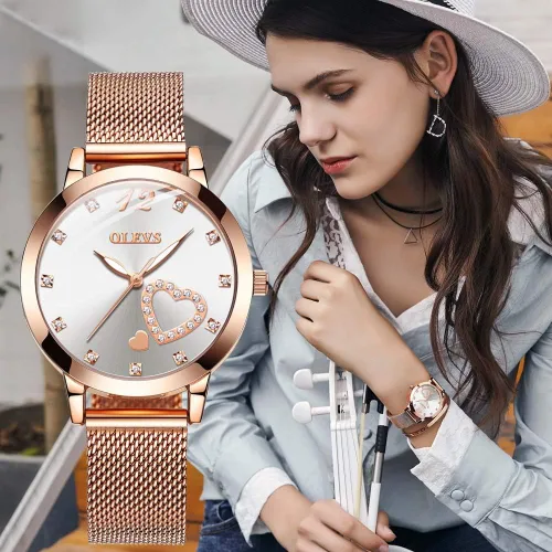Vista 4 de OLEVS Relojes para mujer correa de malla de oro rosa vestido de moda cuarzo japonés impermeable luminoso para mujer conjunto de pulseras
