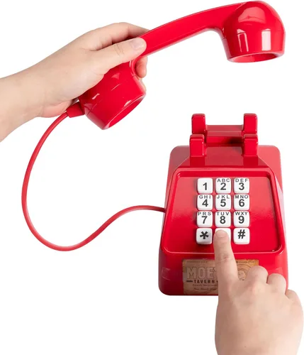 Vista 2 de Disney El teléfono de broma de los Simpsons Moe, cuenta con el icónico teléfono de la taberna de Moe, más de 10 llamadas de broma y frases