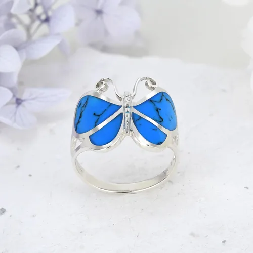Vista 3 de Anillo de plata de ley 925 con diseño de mariposa y turquesa azul simulado.