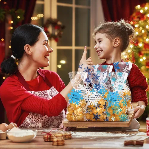 Vista 4 de Vellibring 120 piezas bolsas de celofán de Navidad, bolsas de copos de nieve de invierno, bolsas de plástico transparente para dulces y galletas