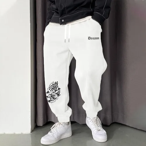 Vista 5 de OYOANGLE Pantalones deportivos con estampado de dibujos animados para hombre, pantalones deportivos para correr, gimnasio, entrenamiento con bolsillo