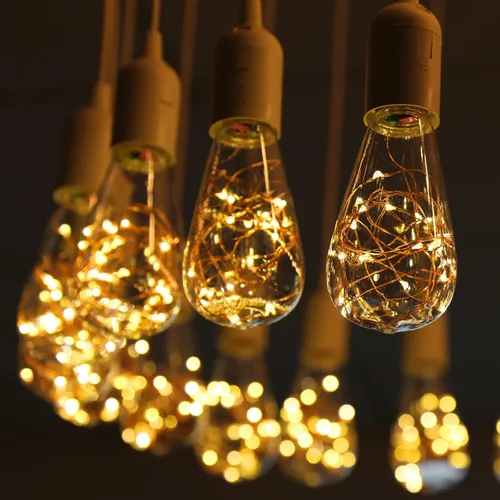Vista 7 de Lxcom Lighting Paquete de 4 bombillas LED de hadas, ST64 E26, bombilla LED Edison en espiral de 3 W, cálida y estrellada, luces decorativas