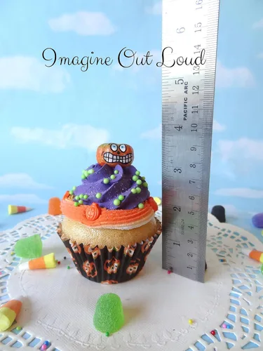 Vista 3 de Fake Cupcake Halloween Purple Lime Sprinkles Jack o Lantern Trick or Treat Cupcake Display Decor