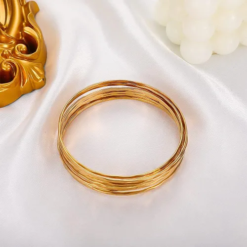 Vista 3 de Choistily Pulseras apilables de oro para mujer, juego de pulseras multiindias para adolescentes y niñas, pulseras lisas de cable en capas, pulseras