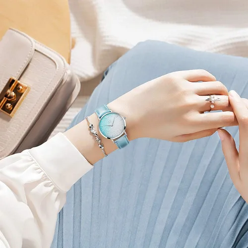 Vista 6 de SK Shengke - Reloj ultra delgado de creativo diseño minimalista, floral o de cielo estrellado con extensibles de piel genuina o acero