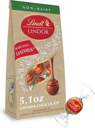 Vista 28 de Lindt Lindor - Trufas de chocolate extra oscuro 60 %, caramelo de chocolate negro con centro de trufa suave y derretida, ideal para regalar, 5.1