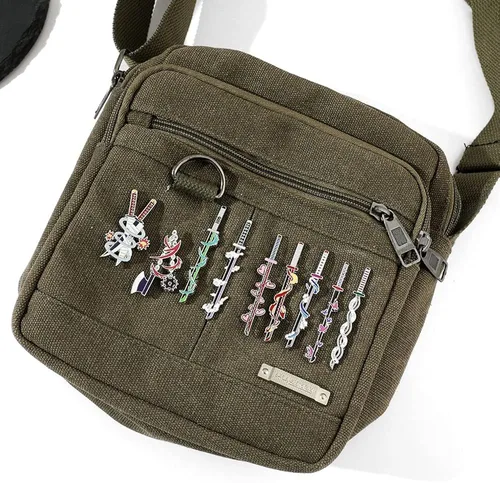 Vista 5 de Alfileres esmaltados de Demon Sword Anime Kimetsu No Yaiba Tanjiro arma solapa Pin Colección Cosplay Broches de recuerdo, regalos para hombres