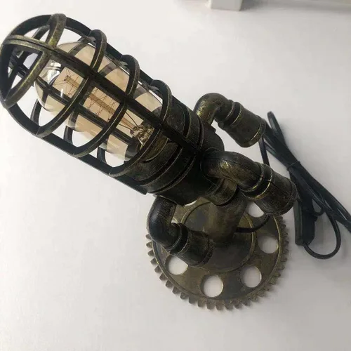 Vista 7 de Lámpara de cohete Steampunk de simulación de resina ABS creativa, luces de escritorio retro luz nocturna, lámpara de mesa pequeña con llama