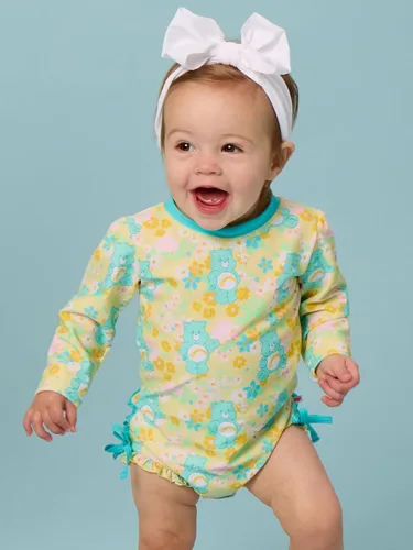 Vista 2 de RuffleButts - Traje de baño de una pieza con protección solar UPF 50+, camiseta de protección floral estampado, manga larga, con cierre zipper
