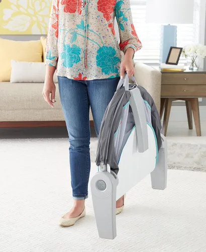 Vista 15 de Fisher-Price Moisés Portátil On-The-Go Baby Dome, Espacio de Juego de Viaje con Juguetes de Desarrollo para Recién Nacidos y Toldo, Windmill