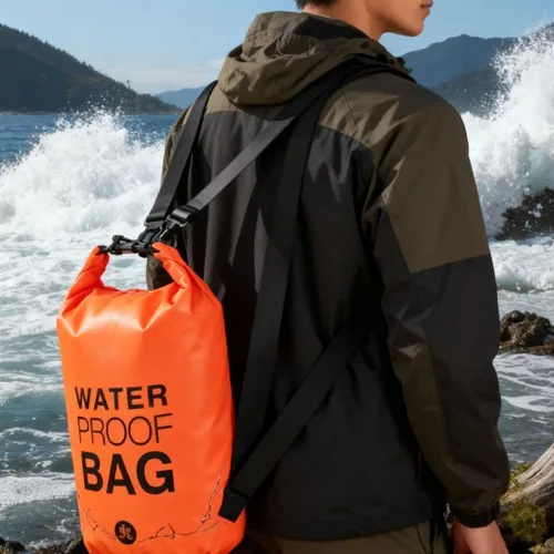 Vista 2 de Bolsa seca impermeable de 5L - Paquete sumergible naranja para kayak, natación y playa