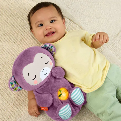 Vista 7 de Fisher-Price Juguetes para bebés Soothe ‘n Snuggle Mono púrpura de peluche máquina de sonido portátil con movimiento de respiración y luces