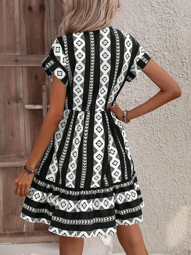 Vista 2 de WDIRARA Mini vestido corto de manga Dolman con cuello en V profundo y estampado geométrico bohemio para mujer