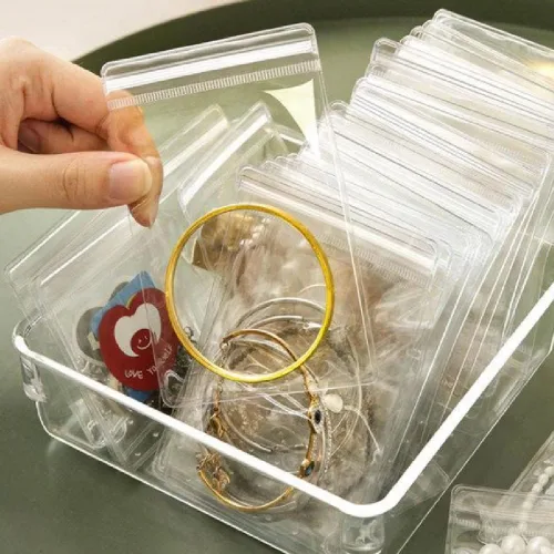 Vista 6 de WEDDINGHELPER Bolsas de joyería, pequeñas bolsas de plástico autosellantes con cierre transparente de PVC para guardar pulseras, anillos, aretes