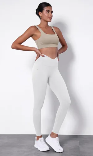 Vista 4 de ODODOS Leggings de yoga con cintura cruzada para mujer, con bolsillos, de 2528 pulgadas, para yoga y entrenamiento