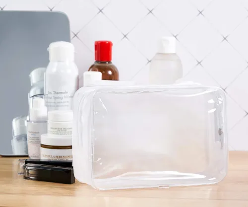 Vista 3 de Paquete de 4 tamaños y neceseres transparentes impermeables, aprobados por la TSA, bolsa de transporte con cremallera, organizador portátil de PVC