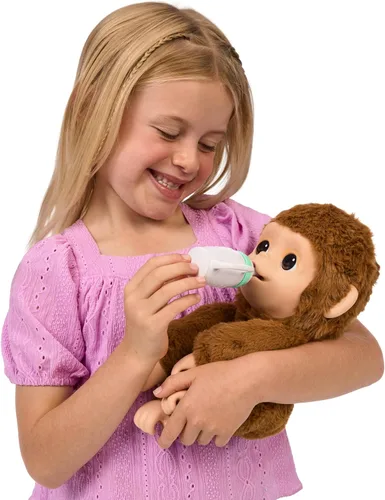 Vista 7 de Little Live Pets My Baby Monkey "Mango" con biberón, juego de animales interactivos y suaves para niños de 4 años en adelante, más de 50 sonidos