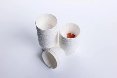 Vista 4 de Superior Trading Co. Vasos desechables de papel para soufflé para aperitivos, alimentos y medicinas, tazas de condimento, tazas de salsa, tazas