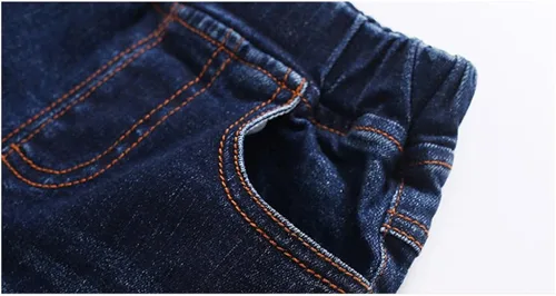 Vista 3 de KIDSCOOL SPACE Pantalones de mezclilla rasgados con cintura elástica para bebés y niños pequeños