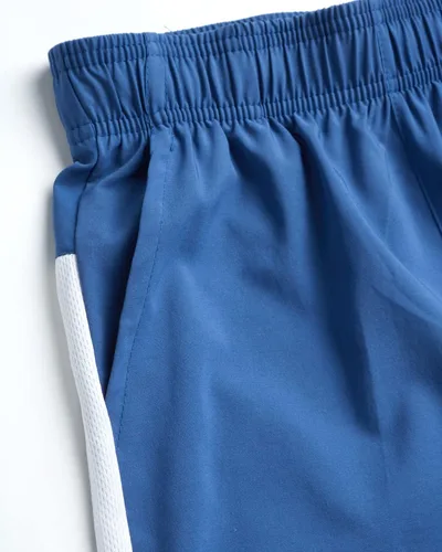 Vista 2 de RBX Pantalones cortos deportivos para niños, pantalones cortos de baloncesto con bolsillos, pantalones cortos de gimnasio para niños (8-16)