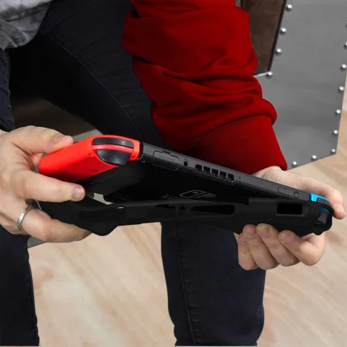 Vista 6 de Orzly Funda de agarre para Nintendo Switch - Cubierta trasera protectora para Nintendo Switch (modelo NO OLED) en modo de gamepad de mano